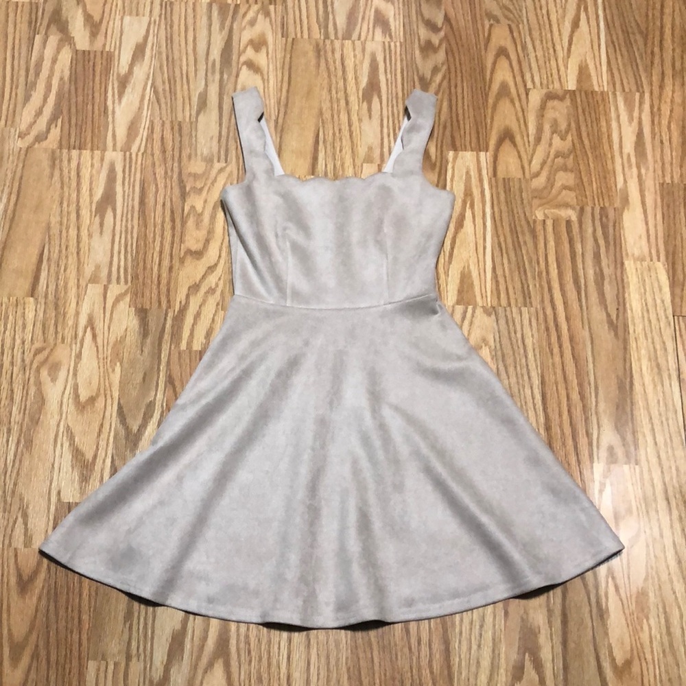 Tan dress with scalloped neckline and straps. NWOT